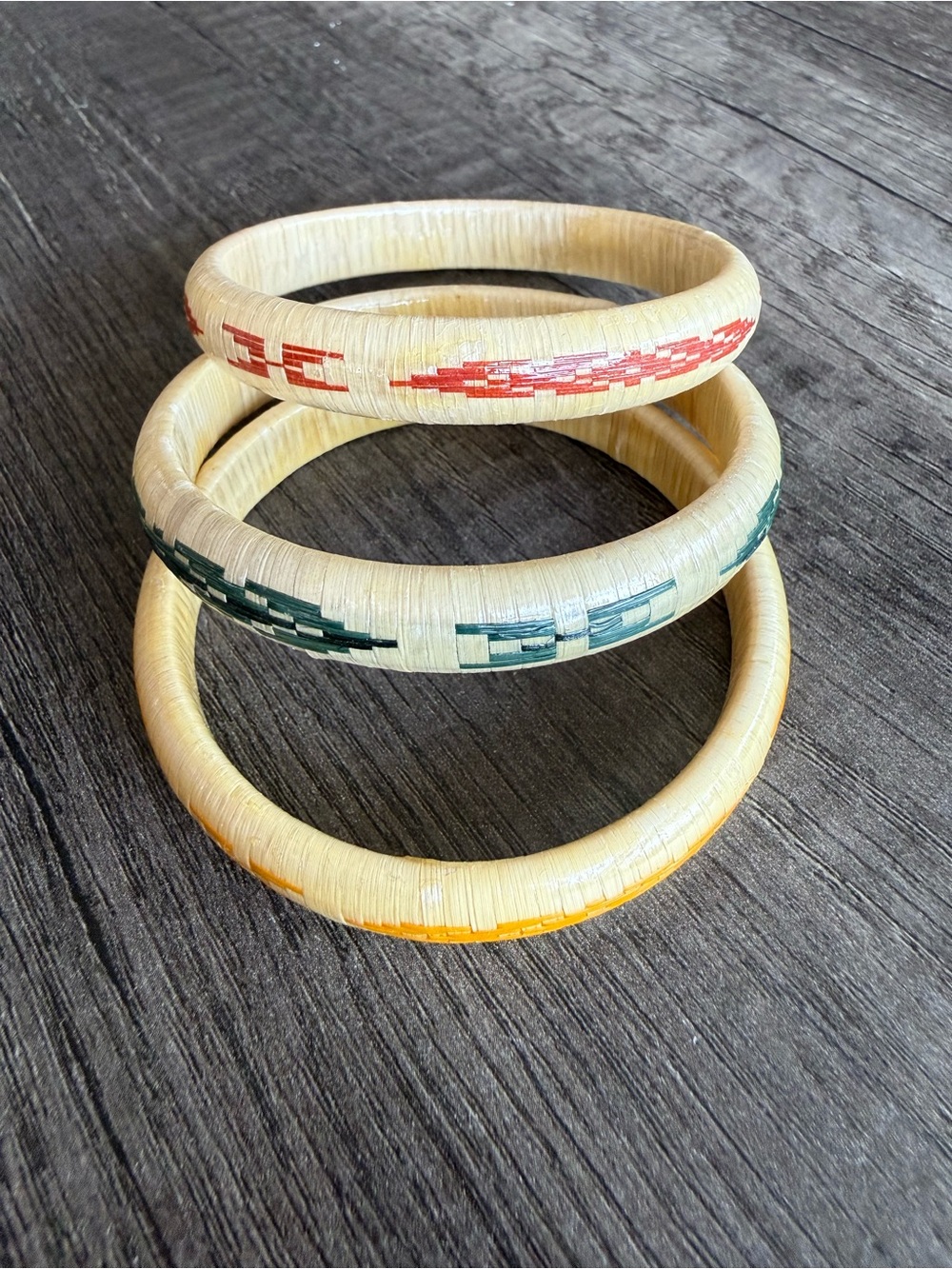 Handcrafted Natural Raffia Bangle Set with Red, Green, and Yellow Accents